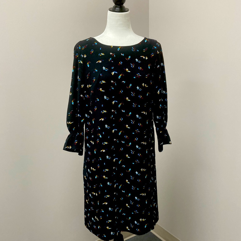 RW&CO black 3/4 sleeve midi dress with colorful patterns.